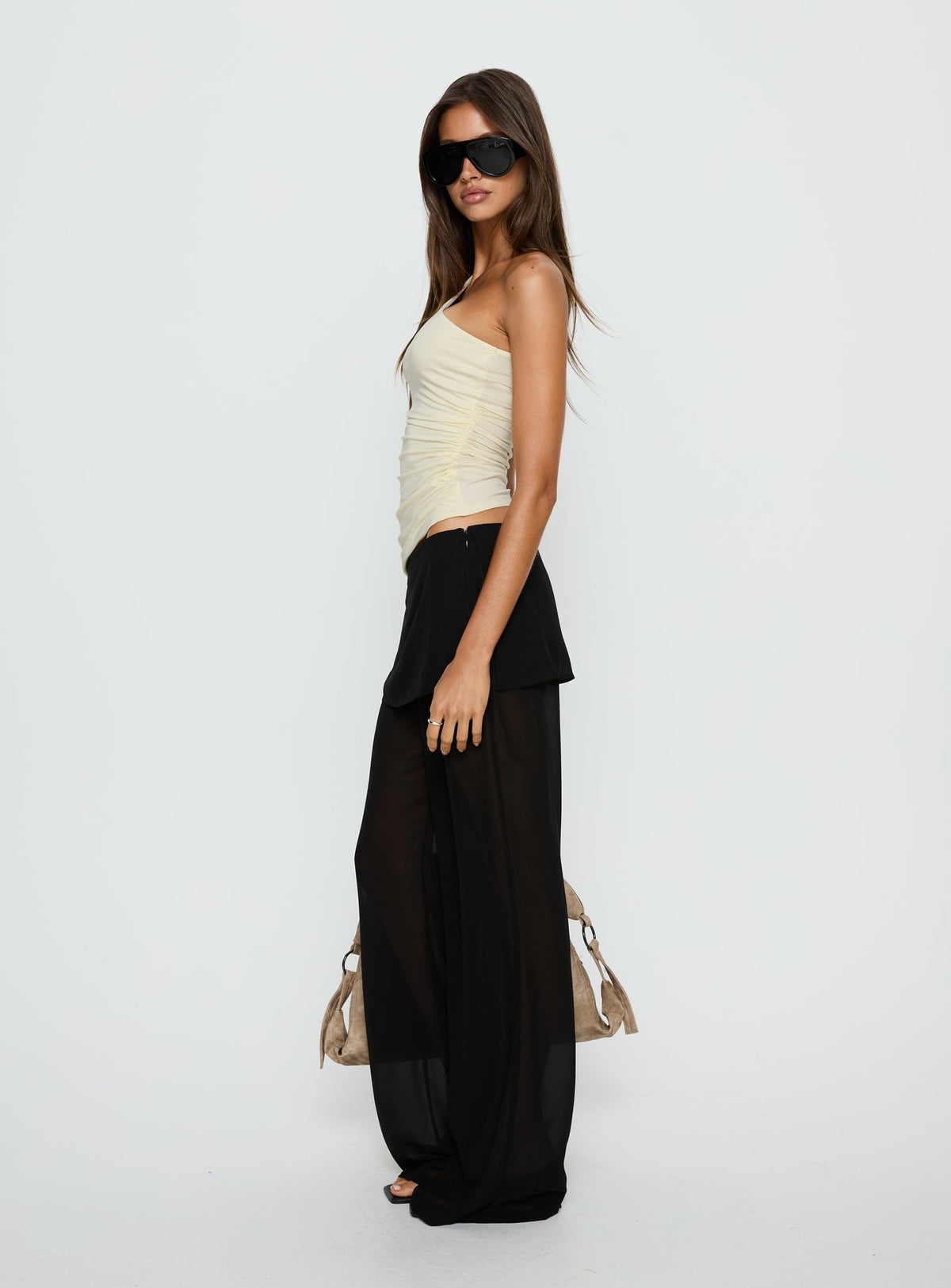 side view of model wearing Princess Polly Jaedon Chiffon Layered Pants Black Mid Rise Pants Pants 
