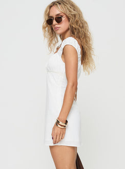 side view of model wearing Princess Polly Haysley Mini Dress White Square Neck 