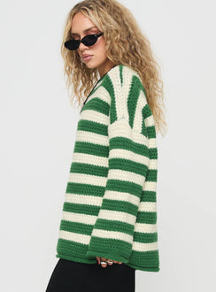 side view of model wearing Princess Polly Brando Knit Sweater Green / Cream Stripe Longline Jumpers Jumpers 
