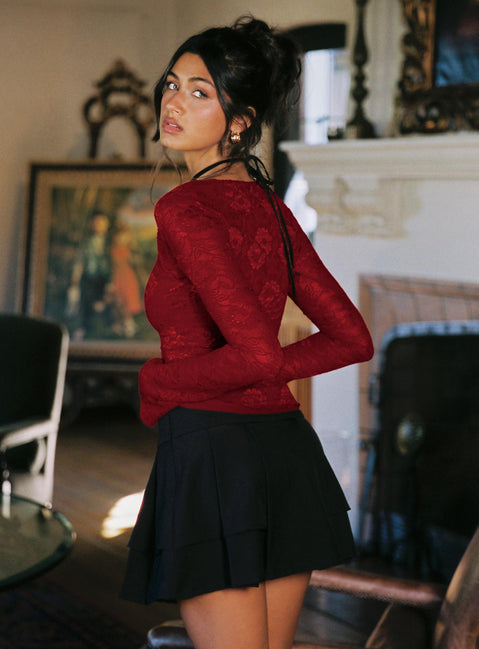 back view of model wearing Princess Polly Yeva Pleat Mini Skirt Black Mini Skirts Skirts 