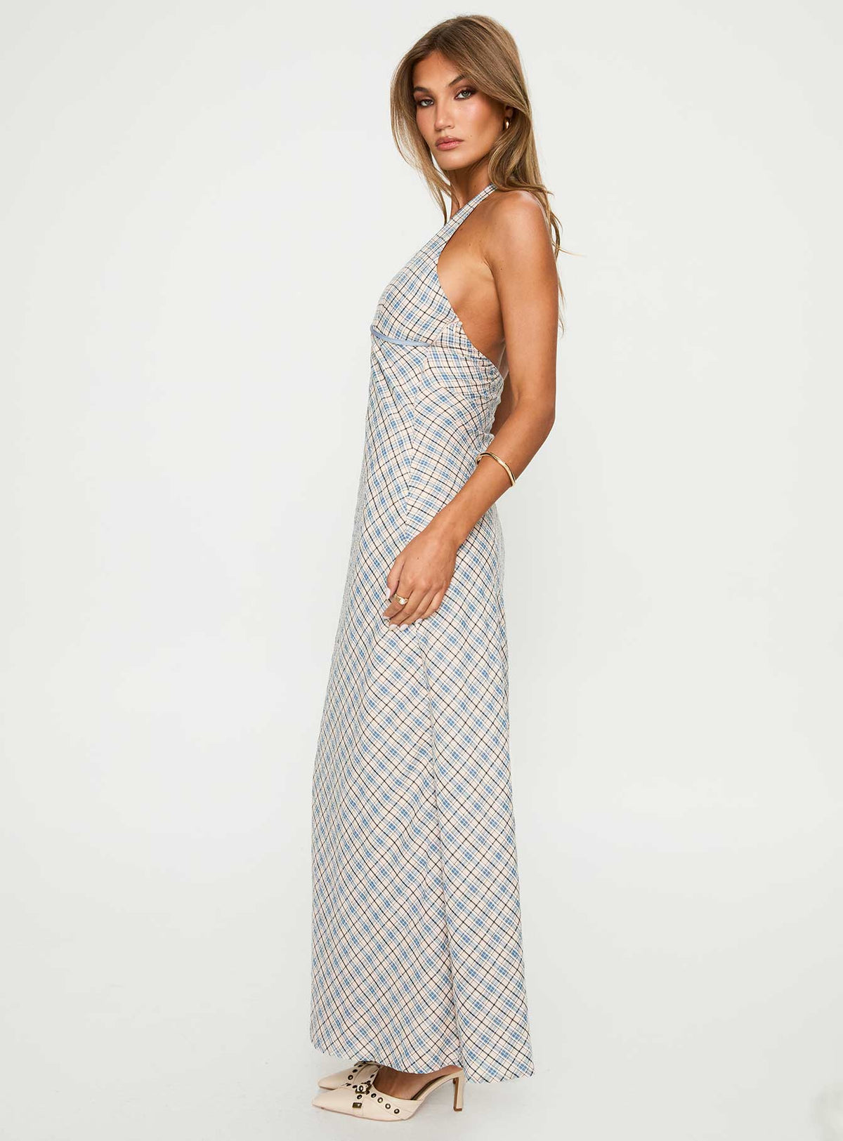 side view of model wearing Princess Polly Evienna Halter Maxi Dress Blue Check Plunger 