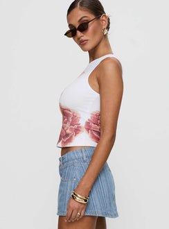 side view of model wearing Princess Polly Pegasus Boat Neck Top White Floral Sleeveless Crew Neck 