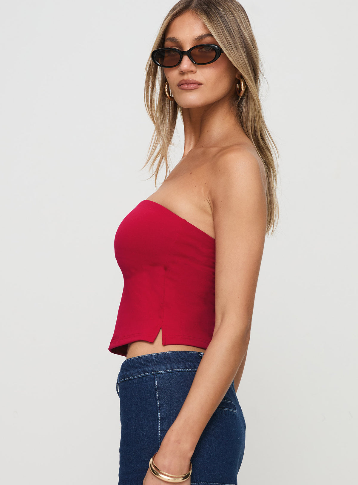 front view of model wearing Princess Polly Aurorah Strapless Top Red Sleeveless straight 