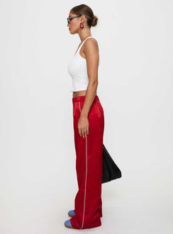 side view of model wearing Princess Polly Travalta Satin Track Pant Red Low Rise Pants Pants 