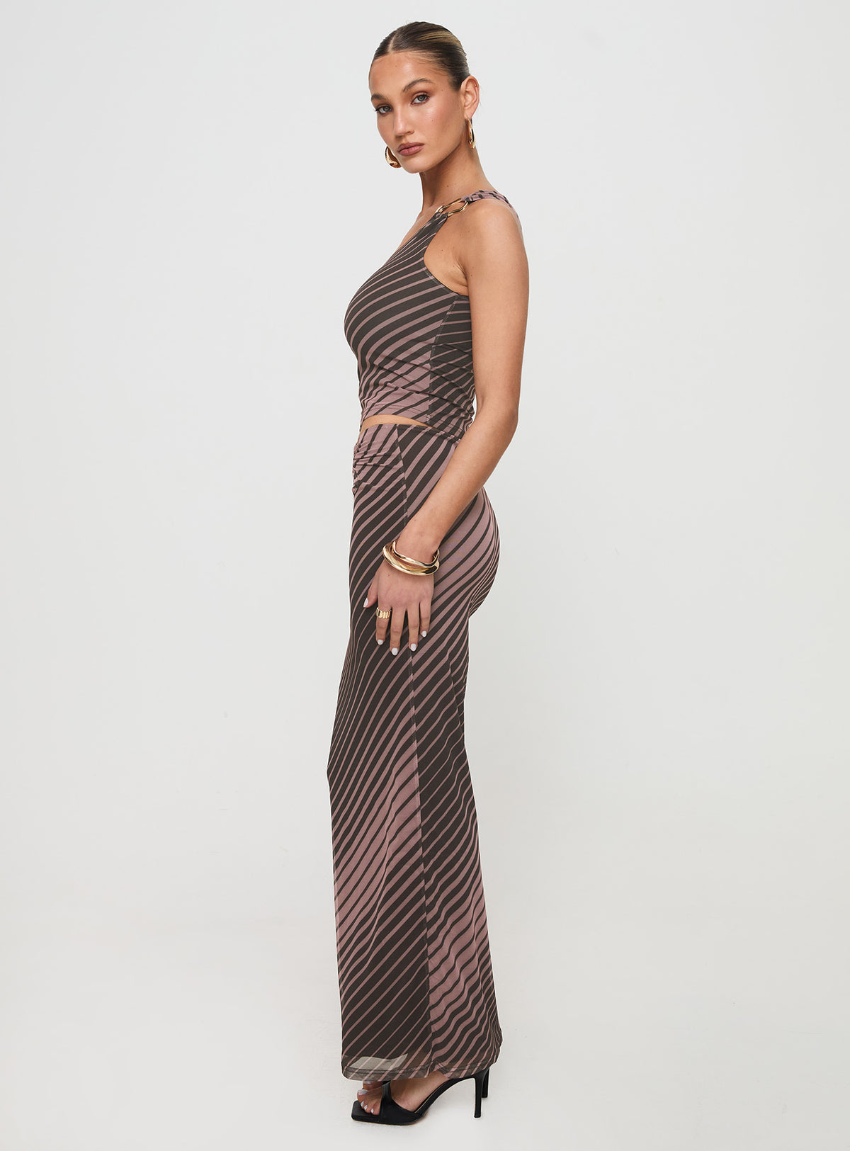   side view of model wearing Princess Polly Whiley Maxi Skirt Multi Stripe Maxi Skirts Skirts 