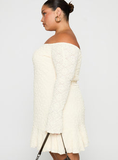 side view of model wearing Princess Polly Vancesca Strapless Mini Dress Cream Curve Straight Neck 