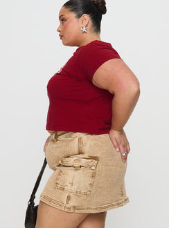   side view of model wearing Princess Polly Velveta Low Rise Denim Skirt Camel Curve Mini Skirts Skirts 