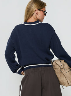 Crafted from the Myrandah V Neck Long Sleeve Knit Jumper Navy womens jumper in short length back view of model wearing Princess Polly