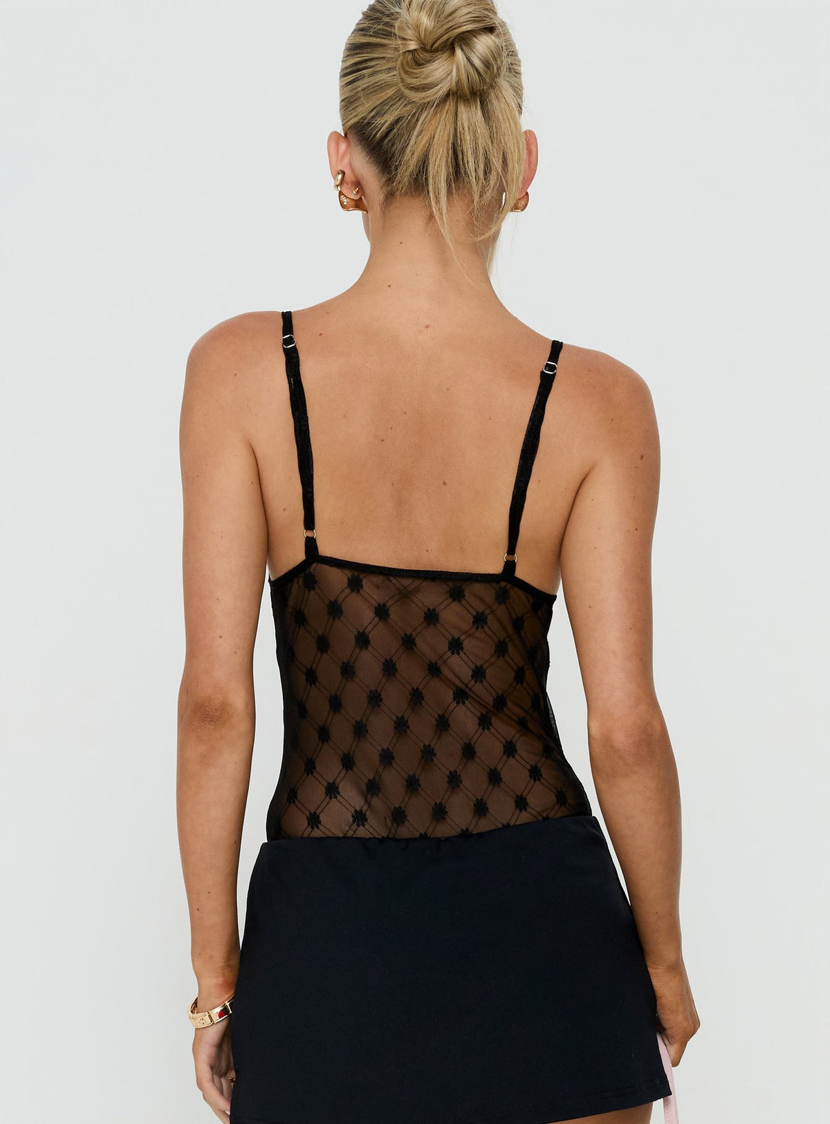 Designed with elegance, the Marlyne Sheer Lace Plunge Neck Bodysuit Black womens-bodysuit in sleeveless form back view of model wearing Princess Polly