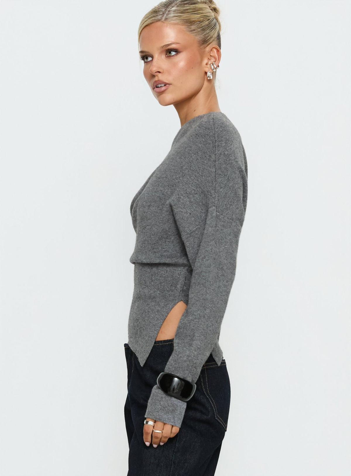 Crafted from the Kaelith Off shoulder Knit Sweater Dark Grey in womens-jumpers with short length side view of model wearing Princess Polly