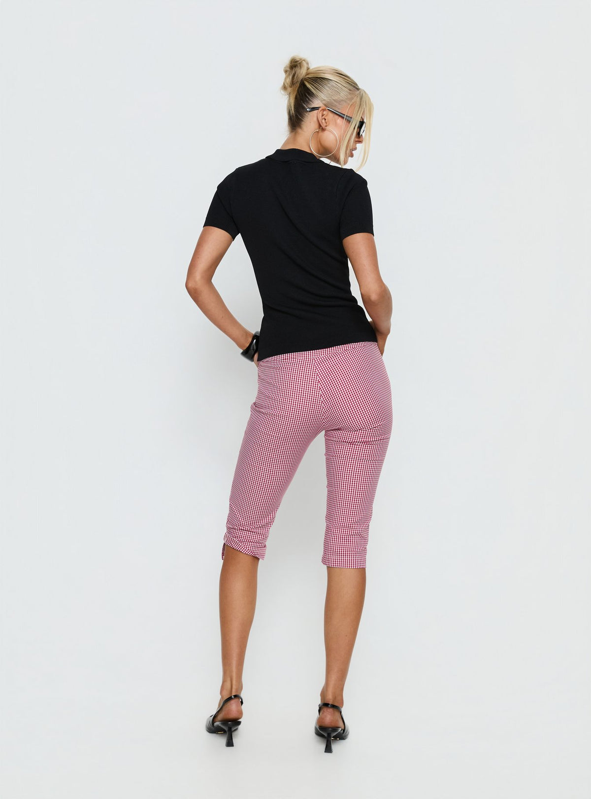 Presenting Rossie Capri Pants Red Gingham womens-regular-pants with high-rise back view of model wearing