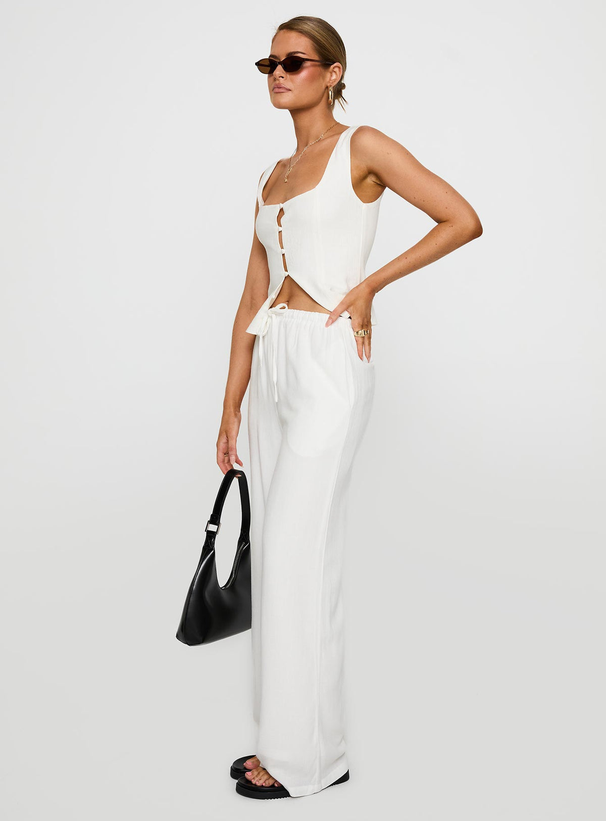 front view of model wearing Princess Polly Parklea Pants White Tall Pants 