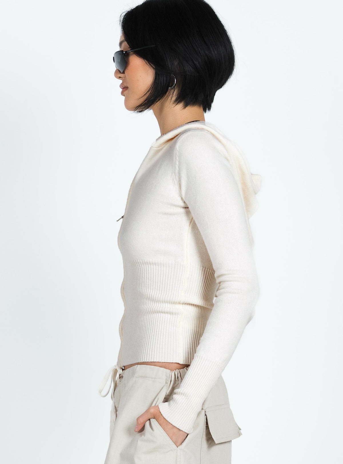 side view of model wearing Princess Polly Elingford Zip Up Hooded Sweater Cream Jumpers 