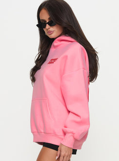 side view of model wearing Princess Polly Princess Polly Hooded Sweatshirt Bubble Text Pink / Red Longline Jumpers Jumpers 