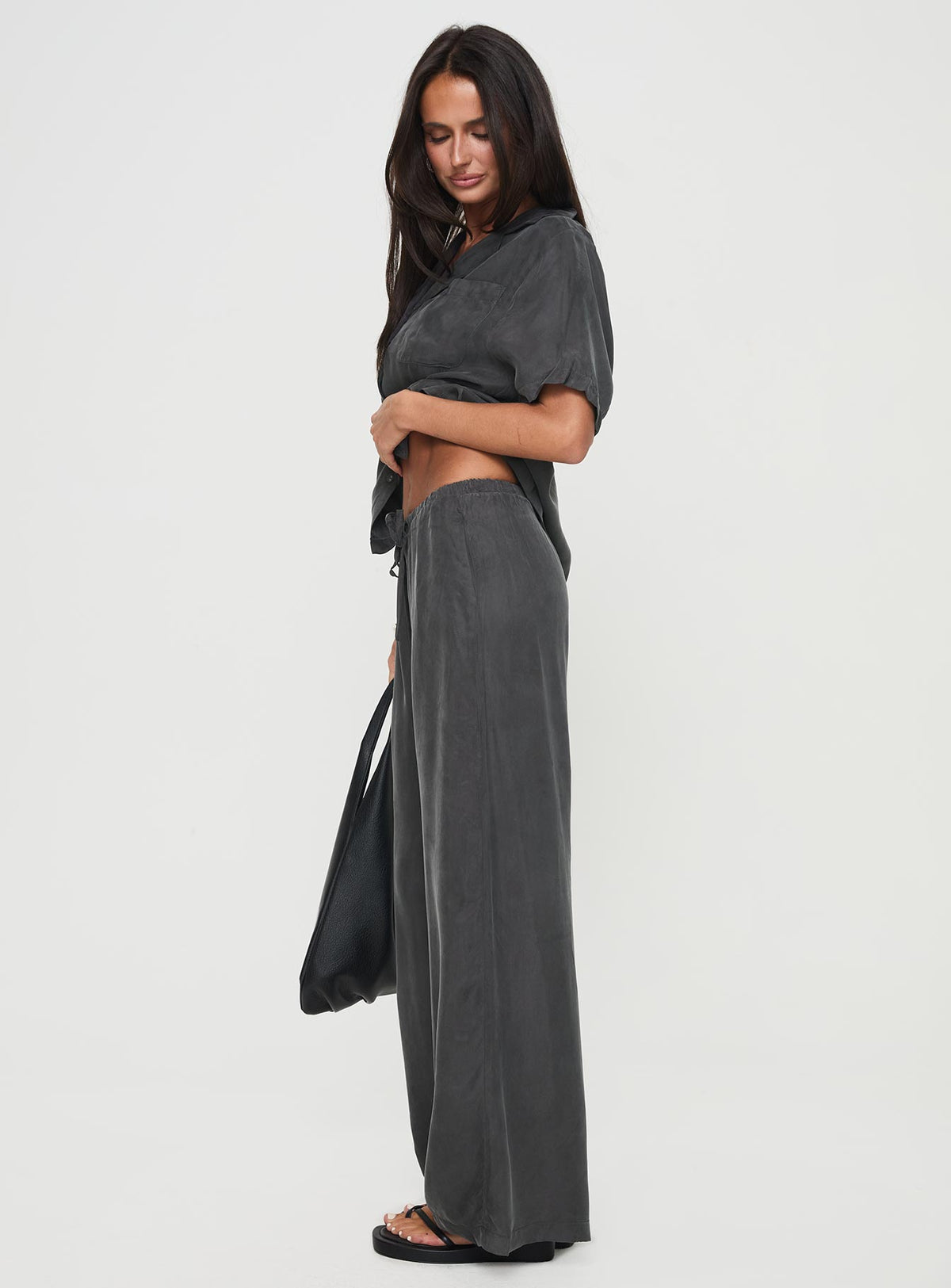 side view of model wearing Princess Polly Mahlab Pants Slate Pants 