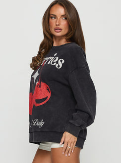 side view of model wearing Princess Polly Hand Picked Graphic Jumper Black Jumpers 