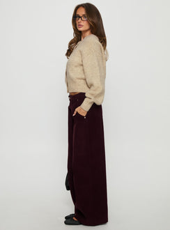 side view of model wearing Princess Polly Jacynda Low Waist Wide Leg Corduroy Jeans Currant Mid Rise Jeans Jeans 