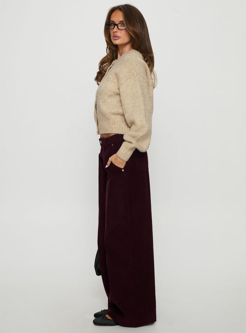 side view of model wearing Princess Polly Jacynda Low Waist Wide Leg Corduroy Jeans Currant Mid Rise Jeans Jeans 