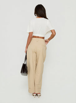 Explore the Kendall Pant Sand womens-regular-pants featuring high-rise pleated wide-leg styling back view of model wearing