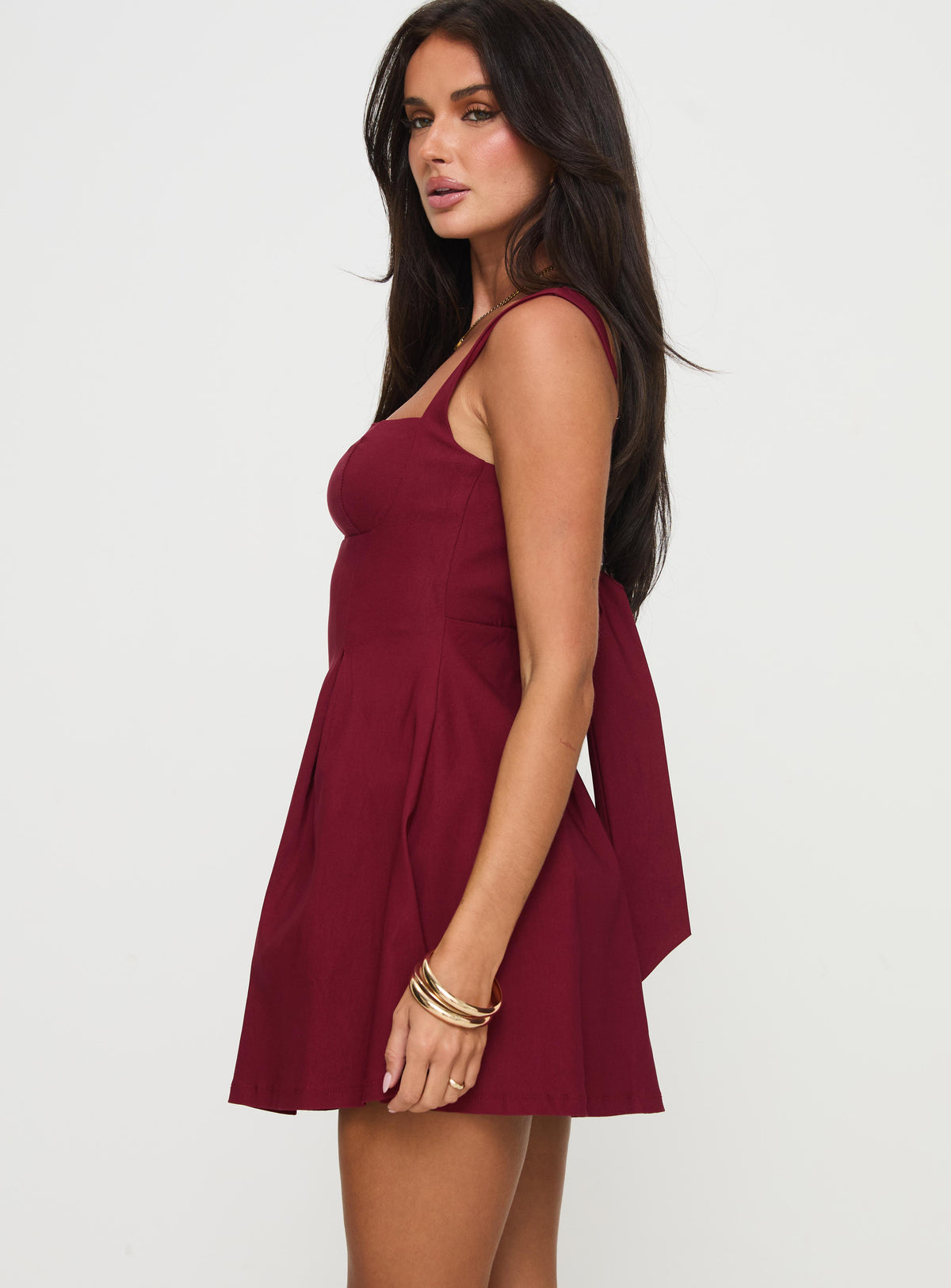 side view of model wearing Princess Polly Xanthus Mini Dress Red Square Neck 