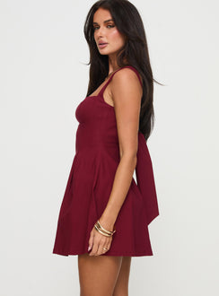 side view of model wearing Princess Polly Xanthus Mini Dress Red Square Neck 