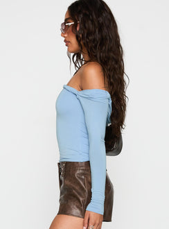 side view of model wearing Princess Polly Dusky Long Sleeve Top Blue Full Sleeves straight 