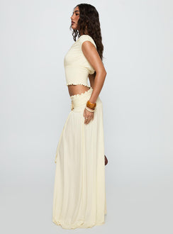   side view of model wearing Princess Polly Full Orbit Shirred Maxi Skirt Cream Maxi Skirts Skirts 