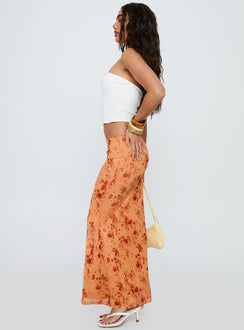   side view of model wearing Princess Polly Shepherd Maxi Skirt Orange Multi Maxi Skirts Skirts 