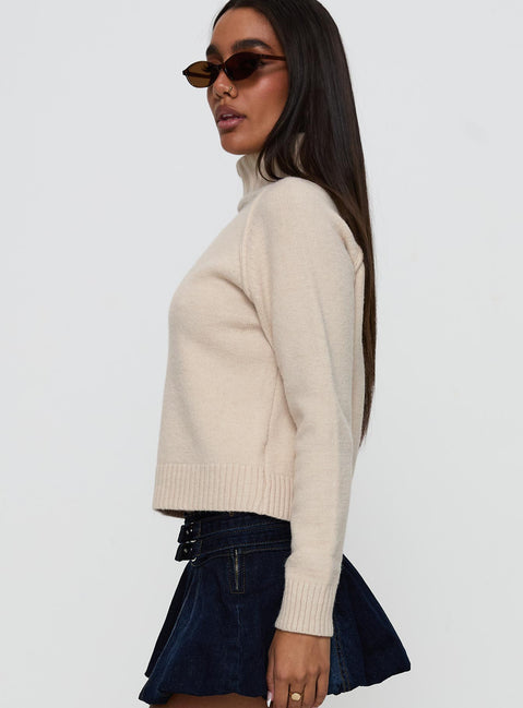 side view of model wearing Princess Polly Enrica Funnel Neck Knit Sweater Cream Cropped Jumpers Jumpers 