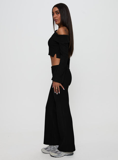 side view of model wearing Princess Polly Try Me Knit Pants Black Low Rise Pants Pants 