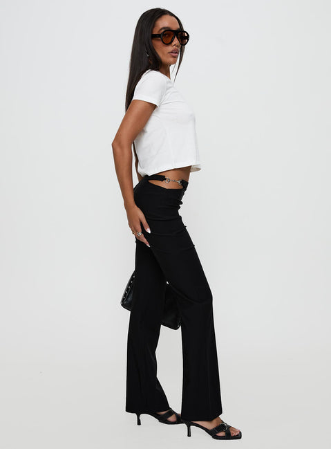 side view of model wearing Princess Polly Eyes On You Flare Pants Black High Rise Pants Pants 