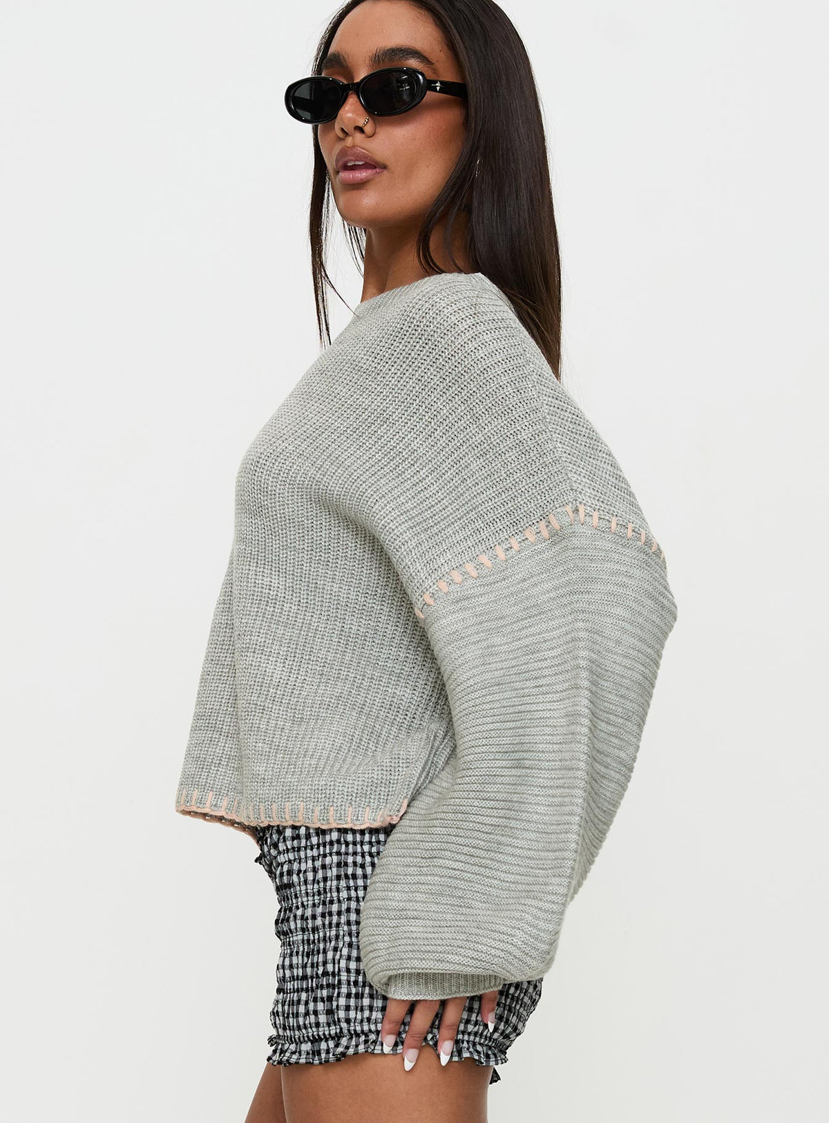 back view of model wearing Princess Polly Baby I'm Back Knit Sweater Grey / Pink Jumpers 