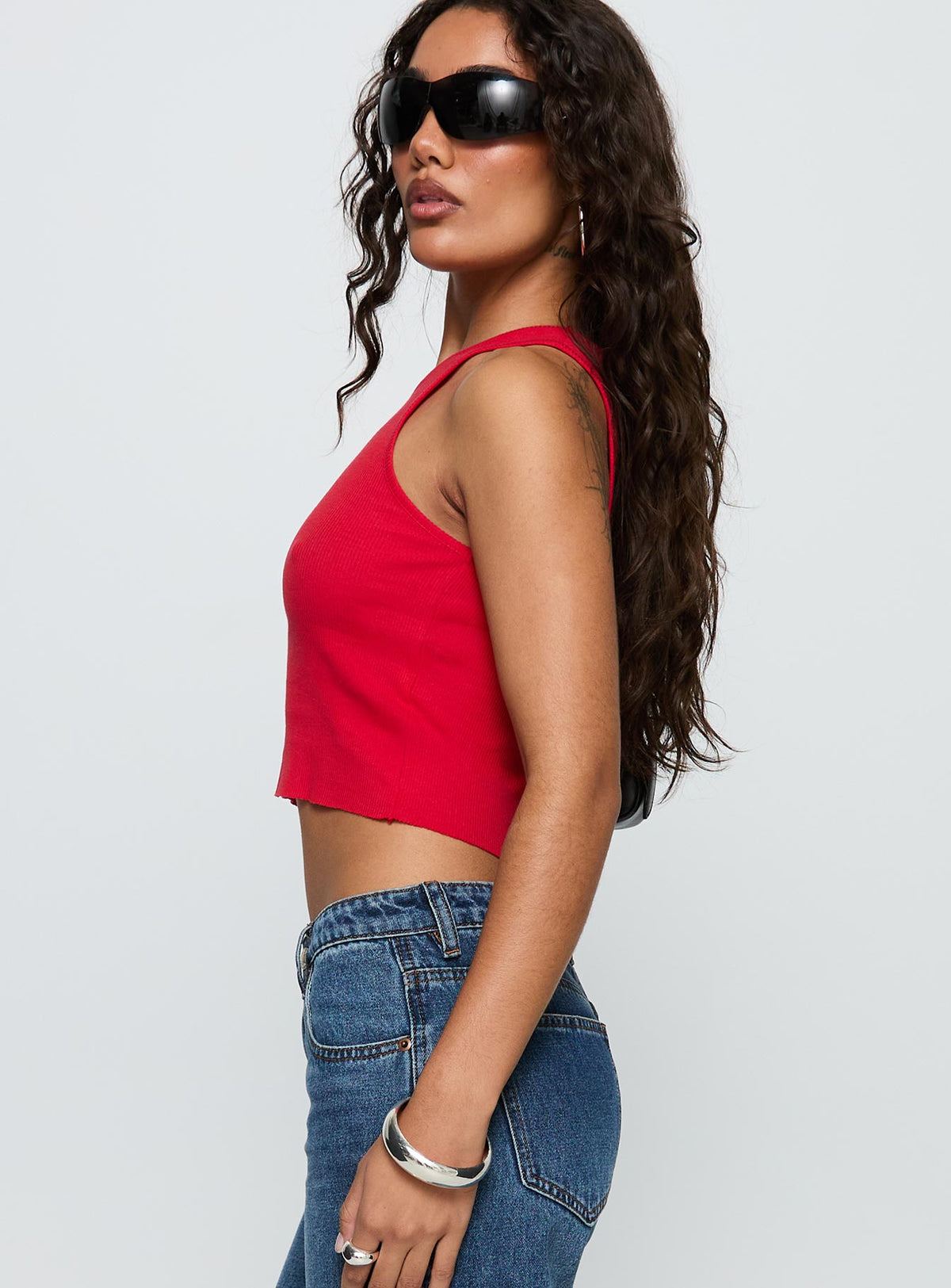 side view of model wearing Princess Polly Boot Scootin Graphic Tank Top Red Sleeveless Crew Neck 