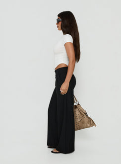 Crafted with the Loved Up Low Rise Baggy Pants Black Tall in womens-regular-pants featuring low-rise waist side view of model wearing Princess Polly