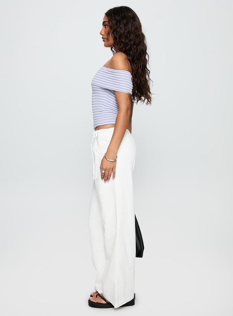 side view of model wearing Princess Polly Leyah Tie Side Pants White Low Rise Pants Pants 