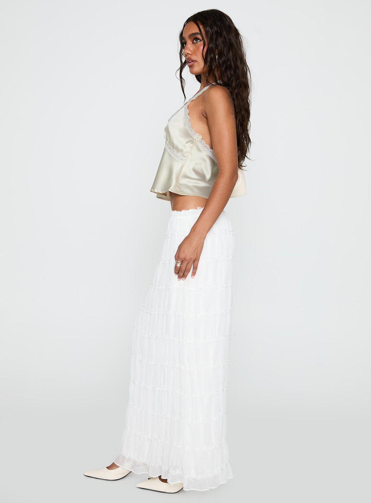   side view of model wearing Princess Polly Estefania Maxi Skirt White Maxi Skirts Skirts 