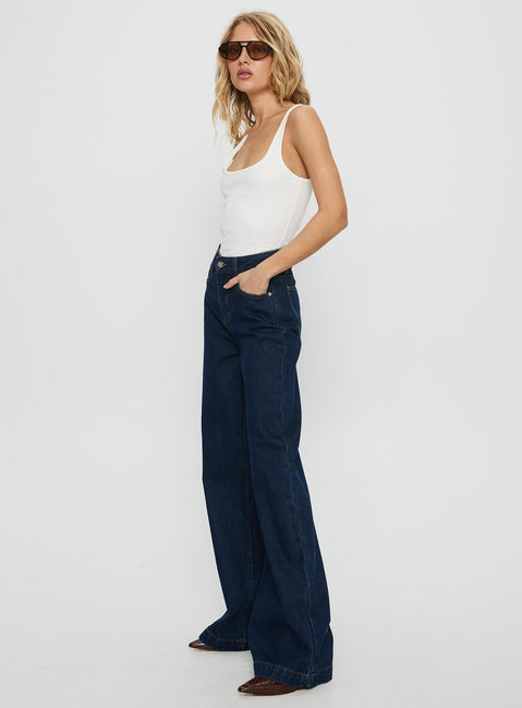 side view of model wearing Princess Polly Goldie High Rise Wide Leg Jeans Indigo High Rise Jeans Jeans 