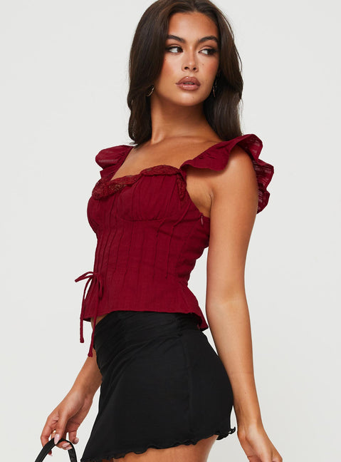 side view of model wearing Princess Polly Mylan Top Burgundy Short Sleeves Sweetheart 