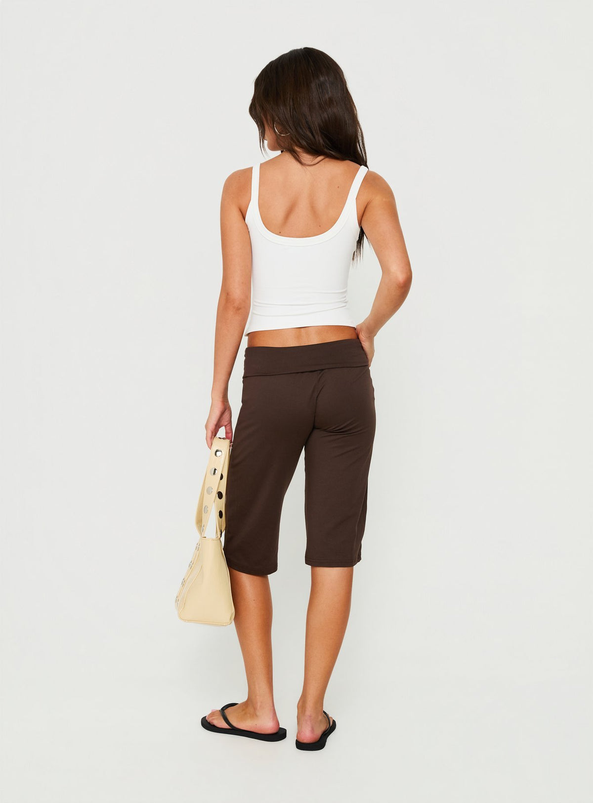 Crafted for style the Laroy Folded Capri Pant Chocolate in womens regular pants with high-rise waist back view of model wearing