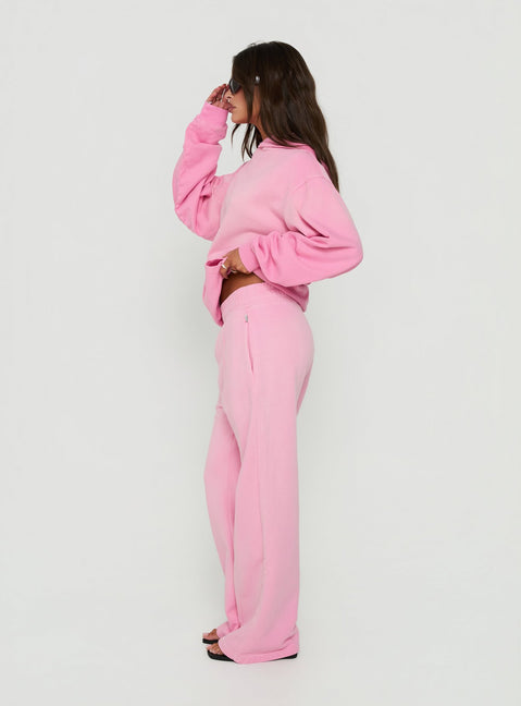 Introducing the AT Fleece Baggy Sweatpant Washed Pink womens-regular-pants with mid-rise waist detail view of model wearing Princess Polly
