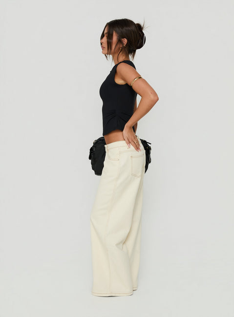 Presenting Picco Ultra Low Rise Wide Leg Jeans Cream in womens-jeans with low-rise side view of model wearing