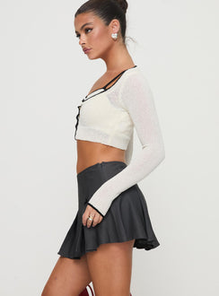   side view of model wearing Princess Polly Little Bow Peep Mini Skirt Grey Mini Skirts Skirts 