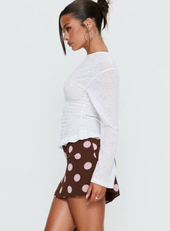   side view of model wearing Princess Polly Adelaida Mini Skirt Brown / Pink Polka Mini Skirts Skirts 