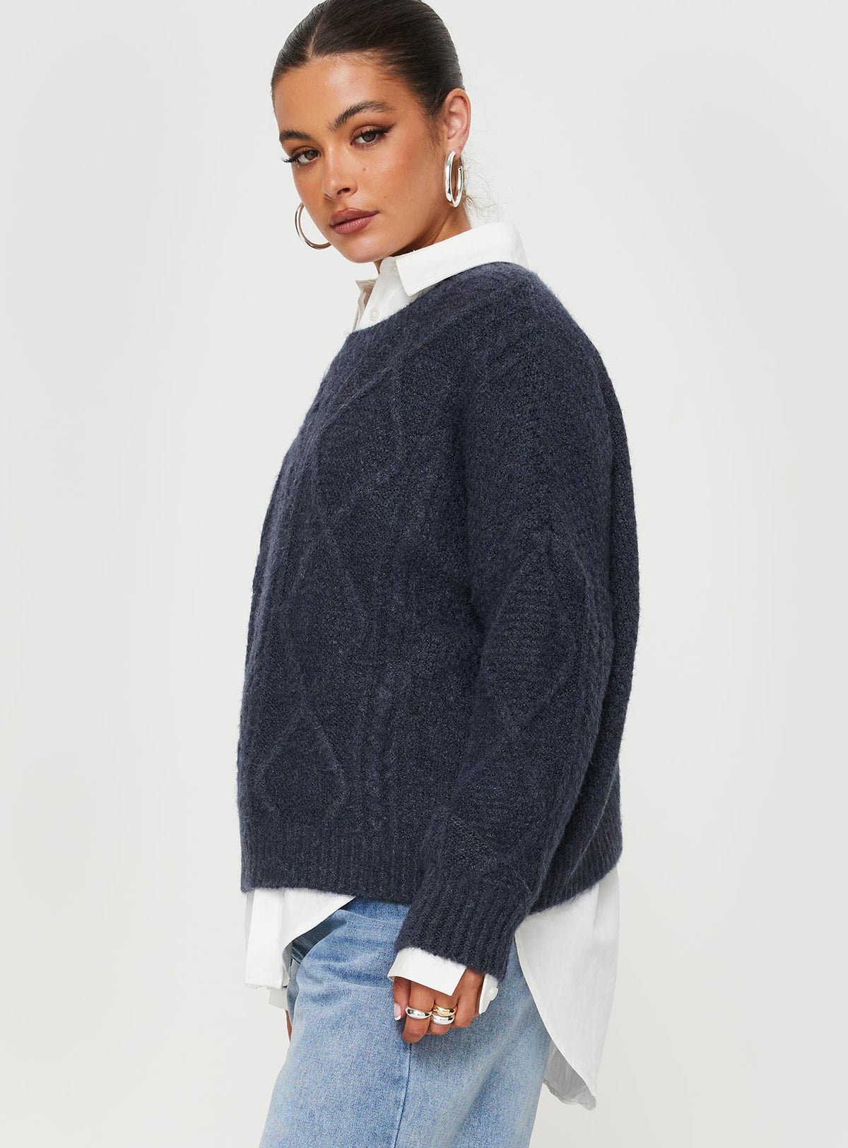 side view of model wearing Princess Polly Canlish Cable Knit Sweater Navy Cropped Jumpers Jumpers 