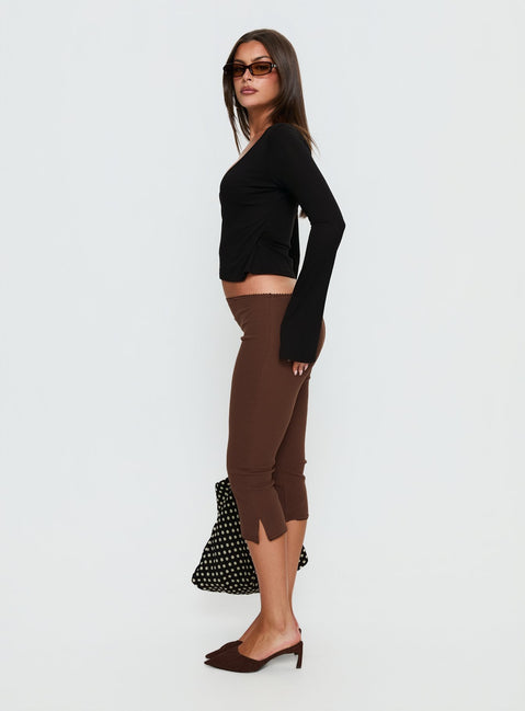 Featuring the Baseline Rib Capri Pants Chocolate in womens-regular-pants with high-rise side view of model wearing