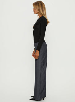 side view of model wearing Princess Polly Khane Low Rise Wide Leg Pant Charcoal Pinstripe Mid Rise Pants Pants 