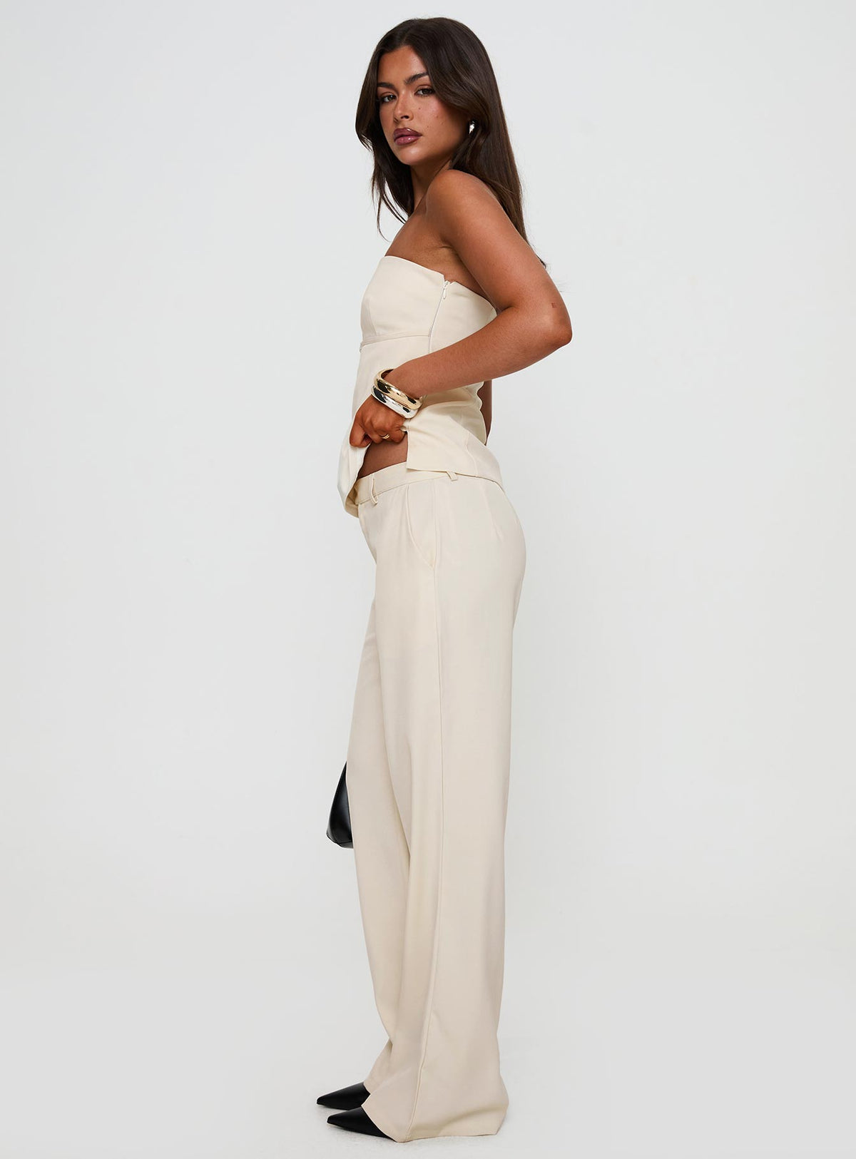 back view of model wearing Princess Polly Irresistible Wide Leg Pant Cream Petite High Rise Pants Pants 