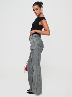 side view of model wearing Princess Polly Chad High Rise Flared Cargo Jeans Washed Grey Mid Rise Jeans Jeans 