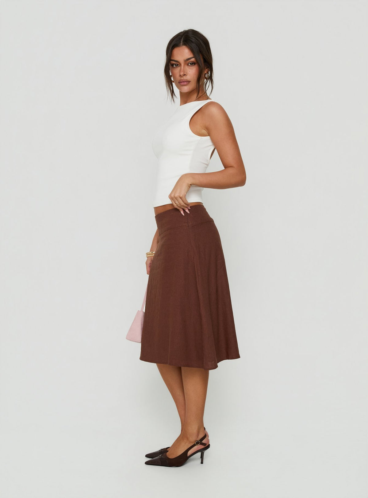 Discover the Such Delight Linen Midi Skirt Chocolate womens-skirts side view of model wearing Princess Polly