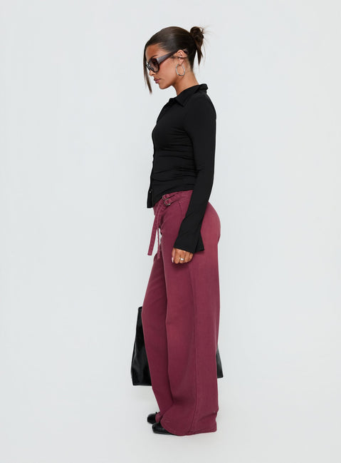 side view of model wearing Princess Polly Boxie Mid Rise Wide Leg Jeans Washed Burgundy Mid Rise Jeans Jeans 